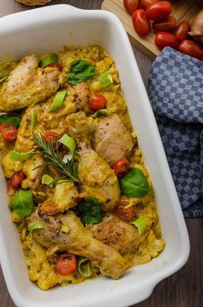 Roasted chicken quarters with curry vegetables