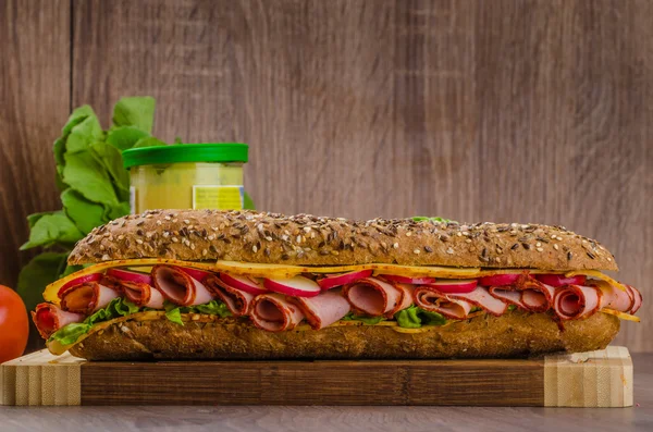 Wholemeal baguette with smoked rump — Stock Photo, Image