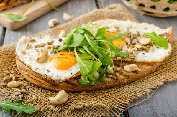 Village bread, fried eggs — Stock Photo, Image