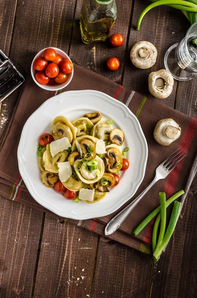 Tortellini stuffed with a mixture of vegetable spring — Stock Photo, Image