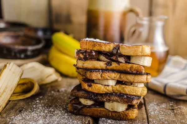 French toast filled banana and chocolate — Stockfoto