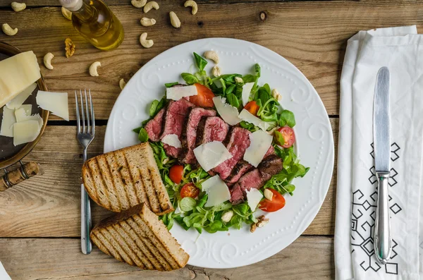 Rump steak with spicy herb butter — Stock Photo, Image
