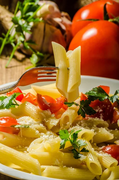 Delicious pasta with tomatoes — Stock Photo, Image