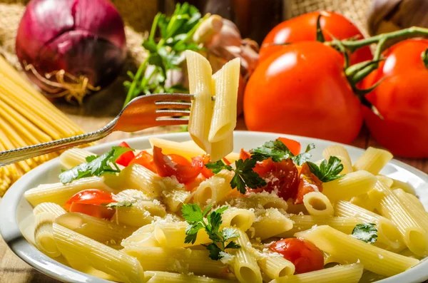 Delicious pasta with tomatoes — Stock Photo, Image
