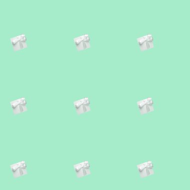 Yeşil arka planda yeşil hediye kutuları. Kusursuz desen, tatil konsepti . 