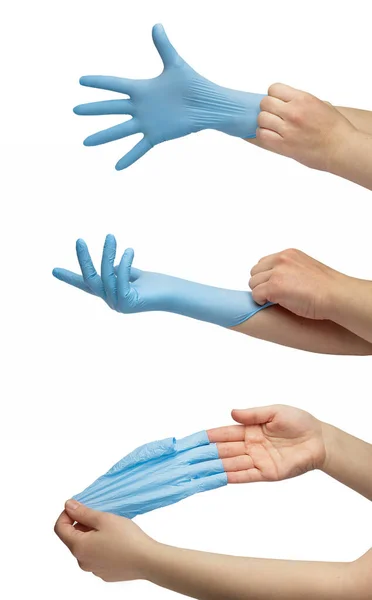 Passo mano getta fuori guanti medici monouso blu isolato su sfondo bianco Fotografia Stock