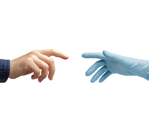 Dłoń w rękawiczce z nitrylem rozciąga się do ręki niewidzialnego człowieka — Zdjęcie stockowe