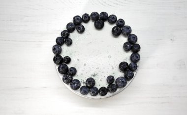 View from above. white blueberry cake. Sweets and pastries