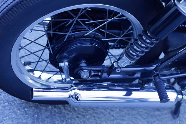 Shiny chrome exhaust pipe retro motorcycle and Shock absorber — Stock Photo, Image