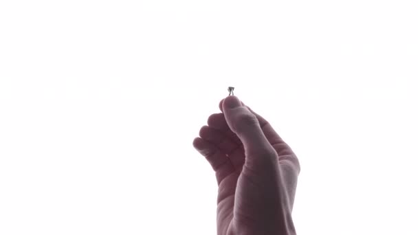 Person Macht Handbewegung Vor Strahlend Weißem Hintergrund — Stockvideo