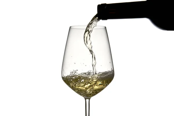 Close Bottle White Wine Poured Glass Piercing Some Waves White — Stock Photo, Image