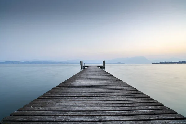 Old Wooden Pier Extends Clear Blue Waters Lake Solitary Path Royalty Free Stock Images