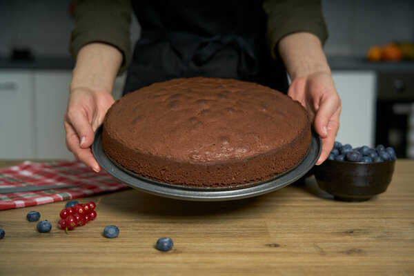 Proud Cook Woman Shows Homemade Chocolate Cake She Has Just Stock Image