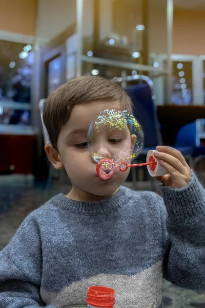 Detail Little Boy Blowing Toy Called Pompero Make Small Big — Fotografia de Stock