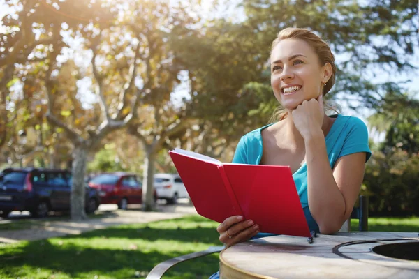 Attractive woman is smiling for someone — Stock Photo, Image