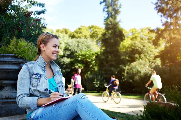 Girl looking on something funny — Stock Photo, Image