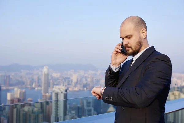 Intelligent man calling to client — Stock Photo, Image