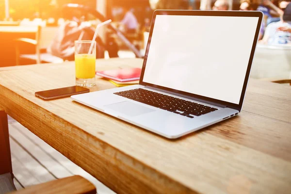 Mobile phone and open laptop — Stock Photo, Image