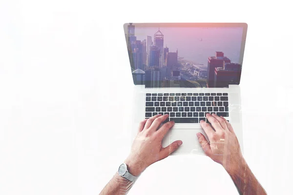 Double exposure top view of hipster guy hands with watches keyboarding text message on laptop computer.