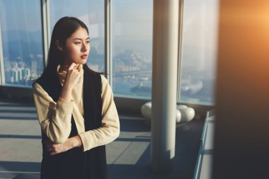 Young confident female office worker