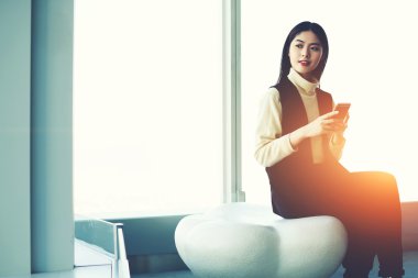 Young female with smart phone 