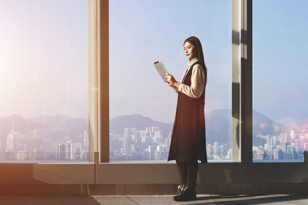 Businesswoman using digital tablet 