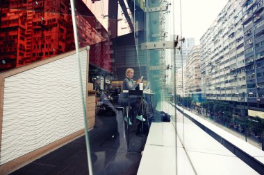 Woman chatting via cell telephone