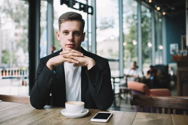 Confident Young Male Crossed Fingers Black Jacket White Shirt Looking — Stock Photo, Image