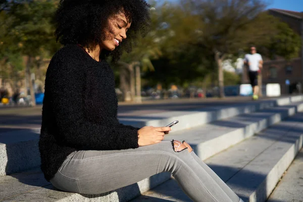 Side View Smiling Young Woman Afro Hairstyle Casual Clothes Sitting — Stock Photo, Image