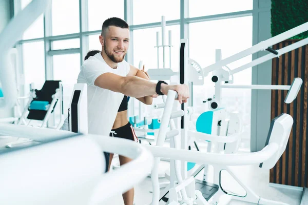 Young Bearded Man Looking Camera Smiling While Trainer Helping Training — Stock Photo, Image