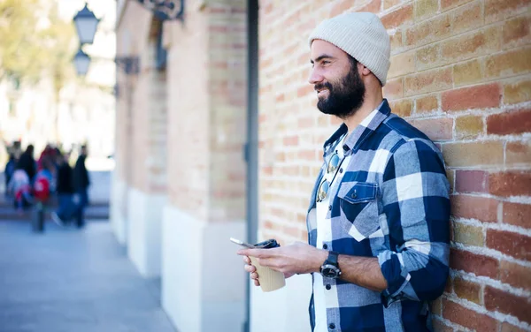 Side View Positive Hipster Male Takeaway Coffee Smartphone Smiling Looking — Stock Photo, Image