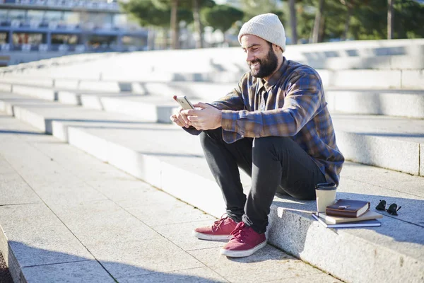 Full Body Cheerful Bearded Hipster Male Casual Clothes Sitting Stone — Stock Photo, Image