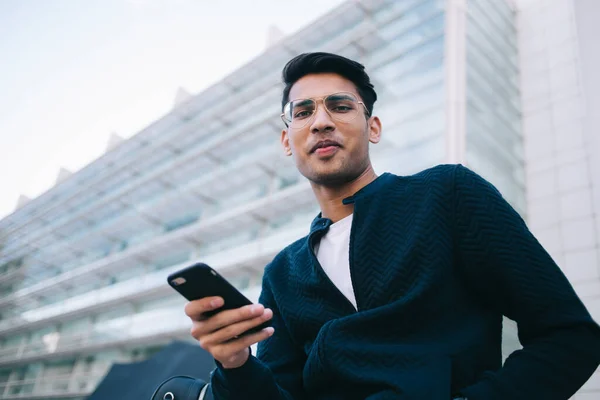 Portrait Positive Hindy Hipster Guy Trendy Spectacles Using Mobile Phone — Stock Photo, Image