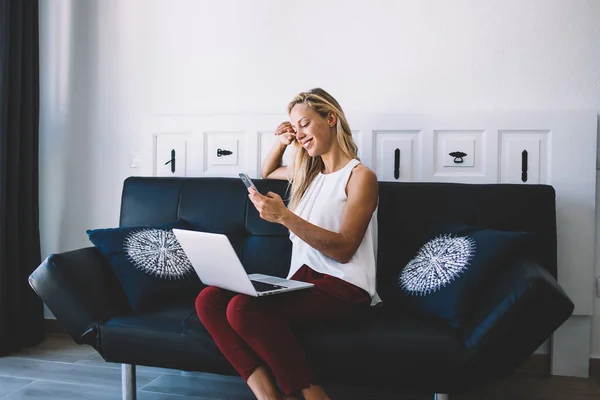 Content Young Lady Casual Wear Laughing While Chatting Mobile Phone — Stock Photo, Image