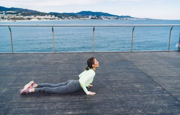 Concentrated Fit Girl Closed Eyes Enjoying Yoga Practice Seashore Pier — Stock Photo, Image