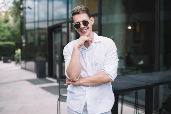 Happy Young Man White Shirt Sunglasses Looking Camera Smiling While — Stock Photo, Image