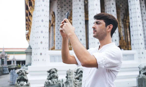 Side View Ethnic Frowned Male Tourist Casual Outfit Standing Street — Stock Photo, Image