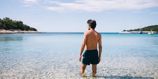 Back View Shirtless Adult Man Shorts Standing Transparent Sea Water — Stock Photo, Image
