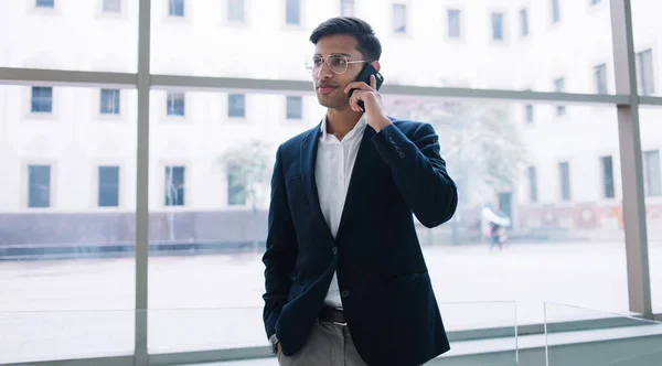 Handsome Hindu Male Entrepreneur Spectacles Talking Mobile Phone Roaming Satisfied — Stock Photo, Image