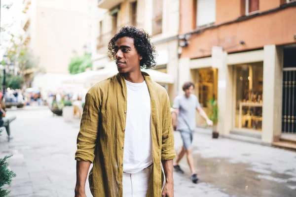 Thoughtful Young Ethnic Male Tourist Curly Hair Trendy Outfit Looking — Stock Photo, Image