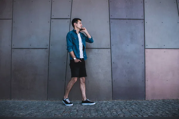 Modern Young Man Trendy Wear Hand Pocket Walking Street Wall — Stock Photo, Image