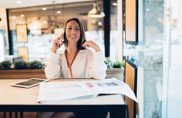 Confident Smiling Middle Aged Female Manager Speaking Smartphone While Working — Foto de Stock