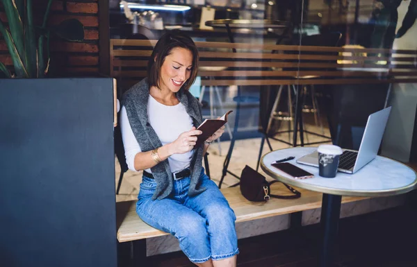 Cheerful Caucasian Woman Reading Book Remote Job Sitting Cafe Terrace — ストック写真