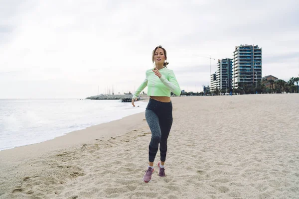 Concentrate Slim Young Woman Sport Outfit Running Shore While Training — Photo