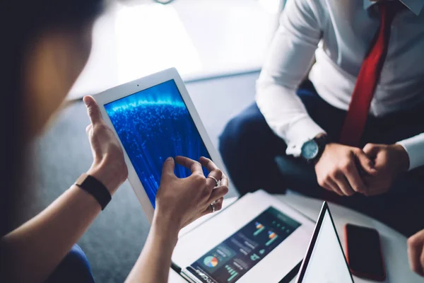 Crop Faceless Female Showing Document Digital Tablet Colleagues While Sitting — Stock Photo, Image