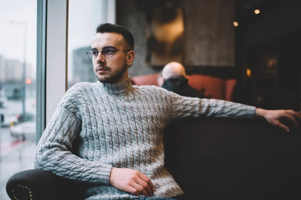 Pensive Bearded Male Casual Clothes Eyeglasses Sitting Comfortable Armchair Looking — Stock Photo, Image