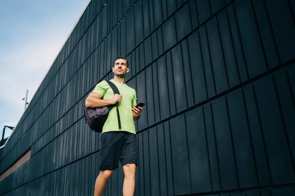 Thoughtful Caucasian Male Bodybuilder Active Sportswear Walking Urban Setting Going — Stock Photo, Image