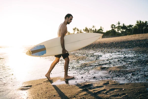 Side View Serious Shirtless Young Male Surfer Surfboard Hand Getting — Stock Photo, Image