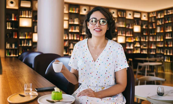 Young Happy Female Eyeglasses Light Dress Smiling Looking Camera While — Stock Photo, Image