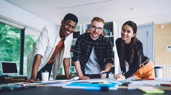 Happy Diverse Colleagues Friendly Smiling Looking Camera While Drawing Draft — Stock Photo, Image